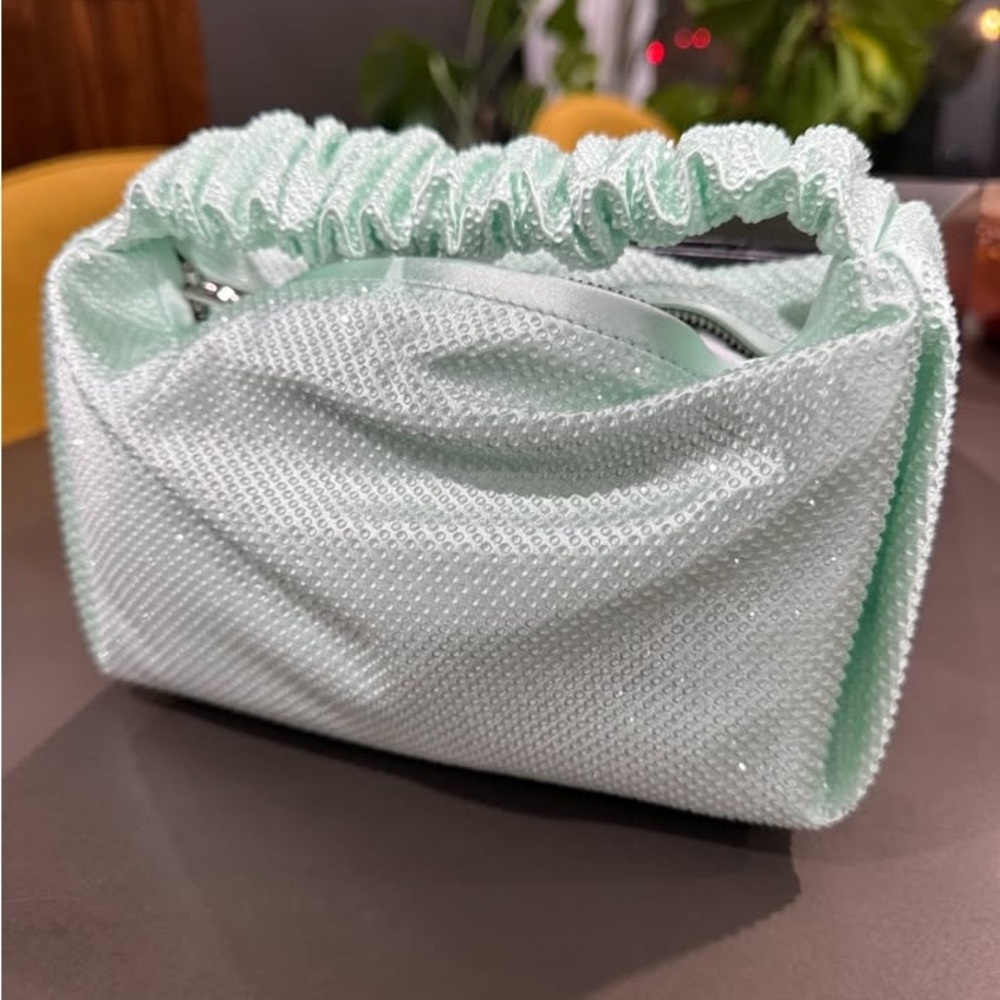 New with Tags, Alexander Wang scrunchie bag in mint.
Includes original box.